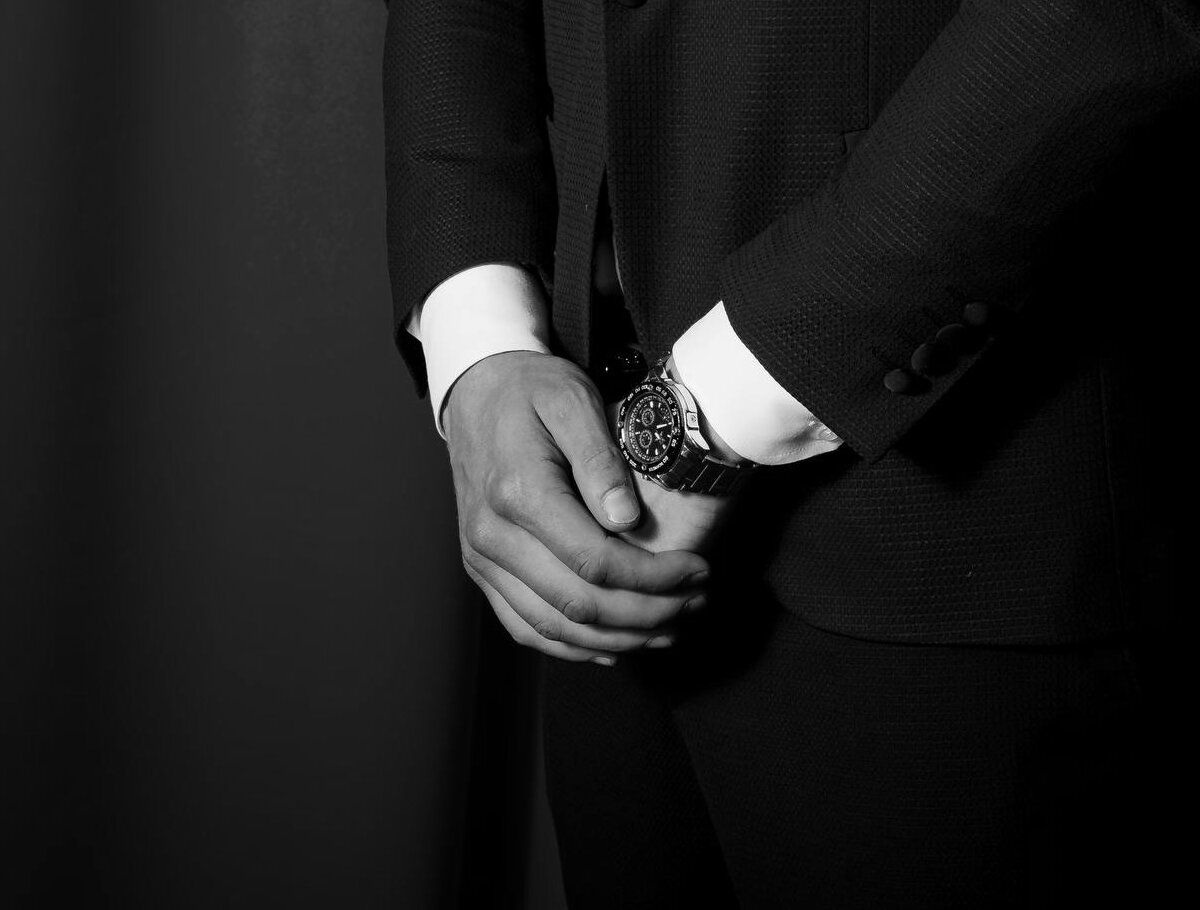 Ivas in a tuxedo, hands and watch